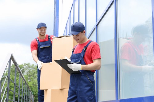 Removal team loading boxes for a same day move in Richmond Upon Thames