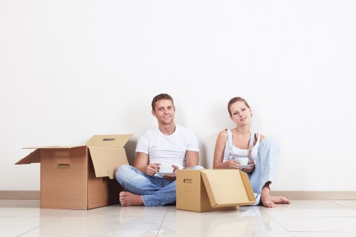 A removal van Richmond upon Thames transporting packed boxes and furniture