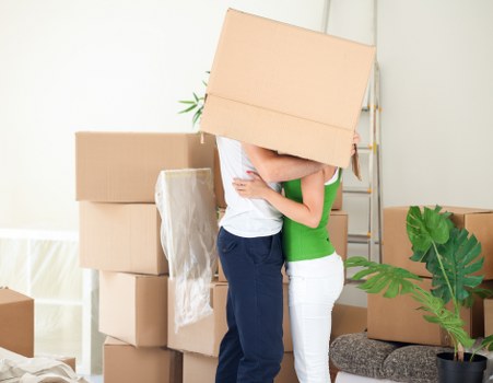 Packing boxes and furniture for a house move in Richmonduponthames
