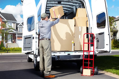 Mover preparing furniture for transport