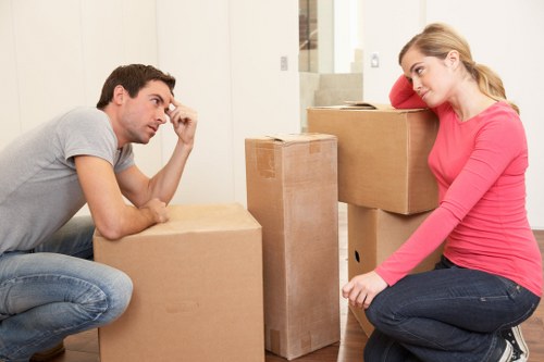 Unpacking boxes and arranging belongings after a move in Richmonduponthames