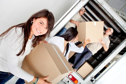 Local man and van vehicle loading furniture and boxes in Richmond upon Thames