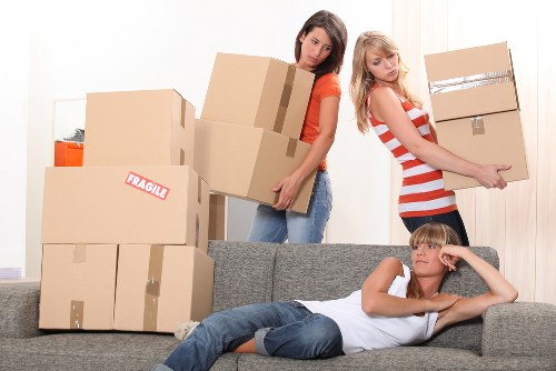 Professional moving team handling items in a Richmond Upon Thames street
