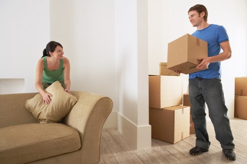 Packed living room ready for home moves in Richmonduponthames